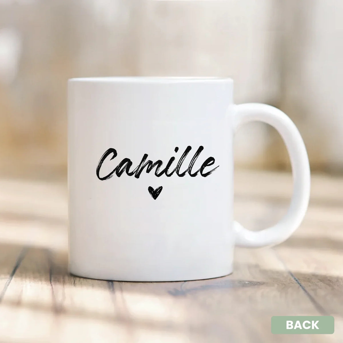 Close-up of a custom name printed on a personalized ceramic mug