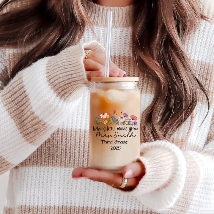 Personalized teacher glass can with a name, grade and school year, held with iced coffee