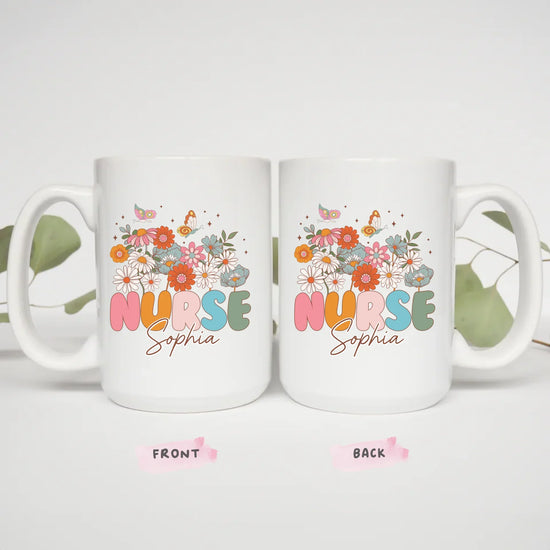Two 15oz Everyday Hero nurse mugs styled with eucalyptus, gift idea