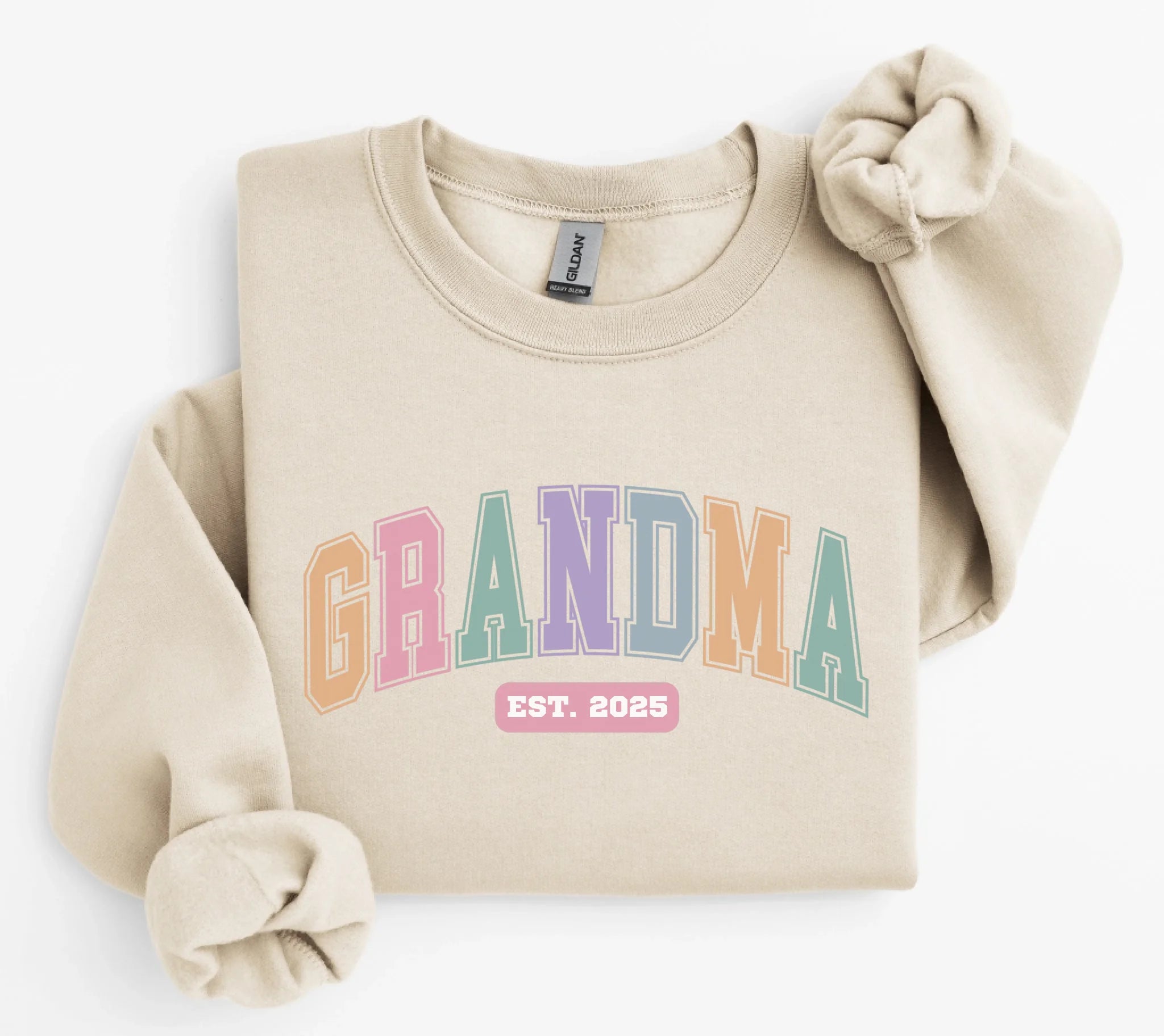 ParadiseMockups_Gildan_18000_FlatLay_Sand_WhiteBG_1