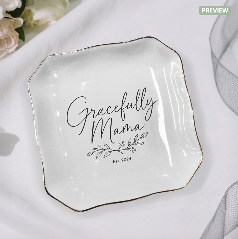 Gracefully Mama personalized ceramic ring dish - blank mockup showing white ceramic with gold accents